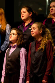 Photo of young women singing in Minneapolis Youth Chorus